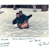 Ретрофото. Арнольд Шварценеггер и Джордж Буш-младший катаются на санках. США. 1991 год