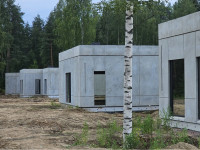 От чего зависит стоимость строительства дома из панелей ЖБИ