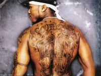 Рэппер 50 Cent вынужден сводить татуировки